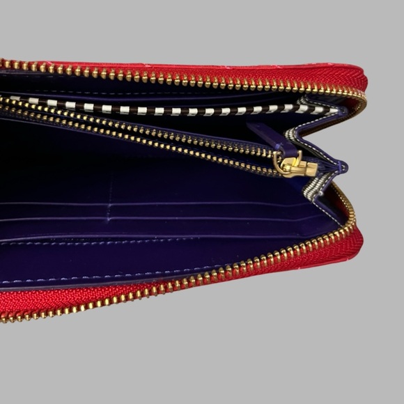 Henri Bendel red quilted wallet with a gold-tone logo. - Picture 12 of 16